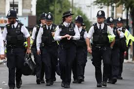 Picture of a Group of Police Officers patrolling