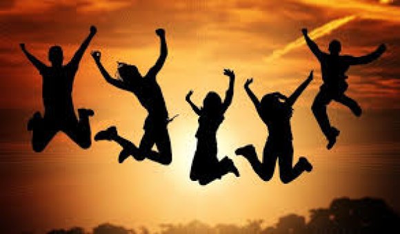 Picture of silhouette of youths jumping in the air